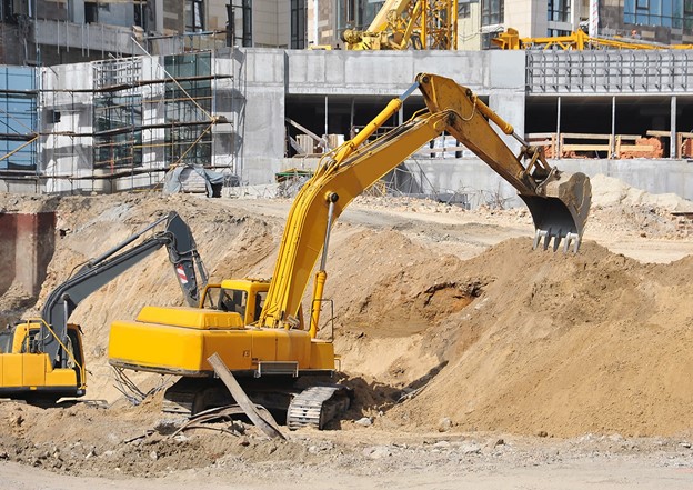 Yellow digger on work site